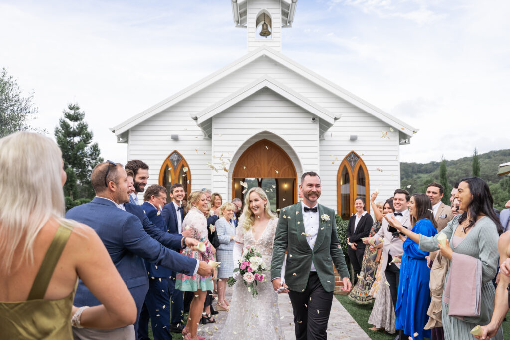 group photo, couple leaving the ceremony